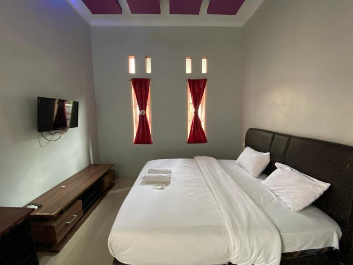 Djaboerigin Mongonsidi Guest House Redpartner Medan Exteriör bild