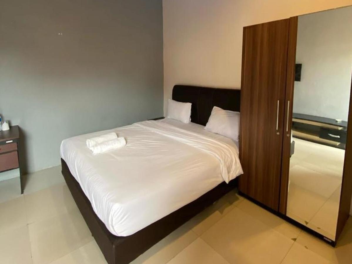 Djaboerigin Mongonsidi Guest House Redpartner Medan Exteriör bild